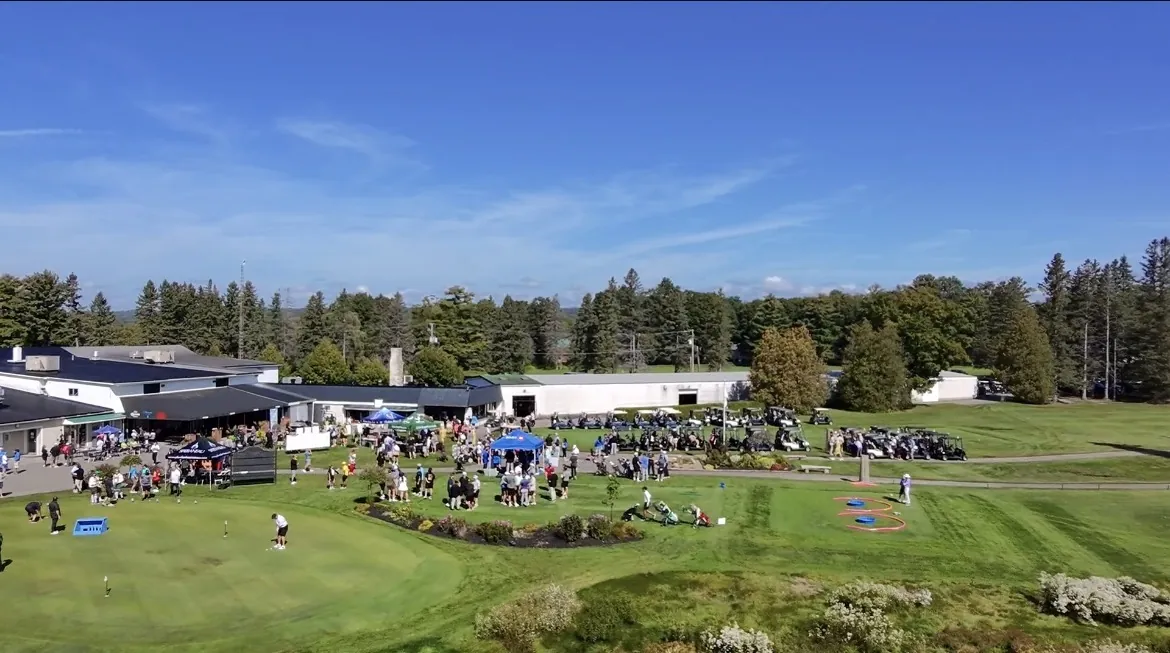 Aerial drone view of an event on a golf course